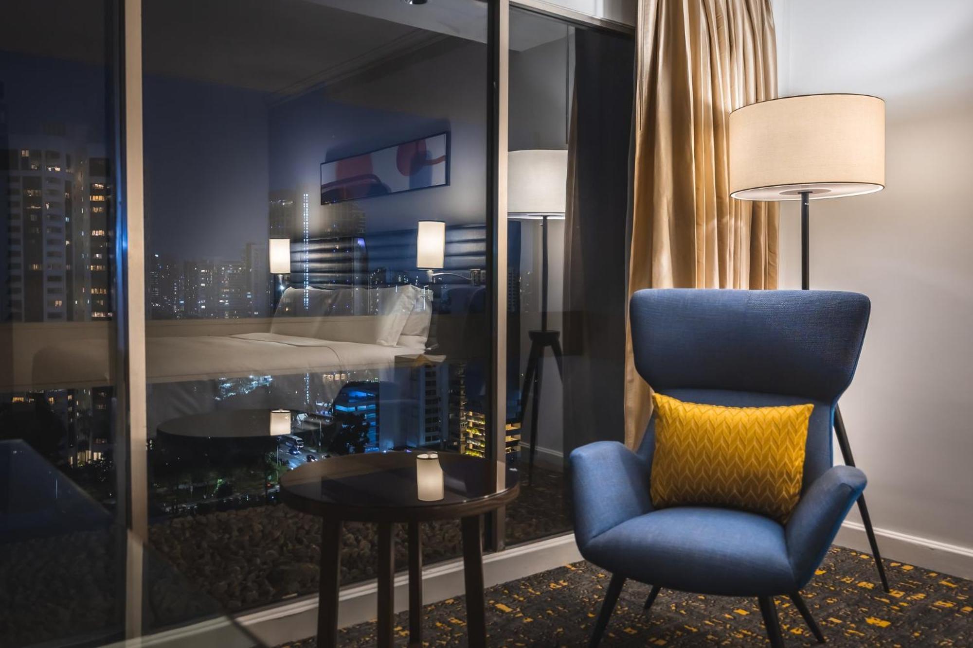 Voco Orchard Singapore By Ihg מראה חיצוני תמונה A room at the hotel