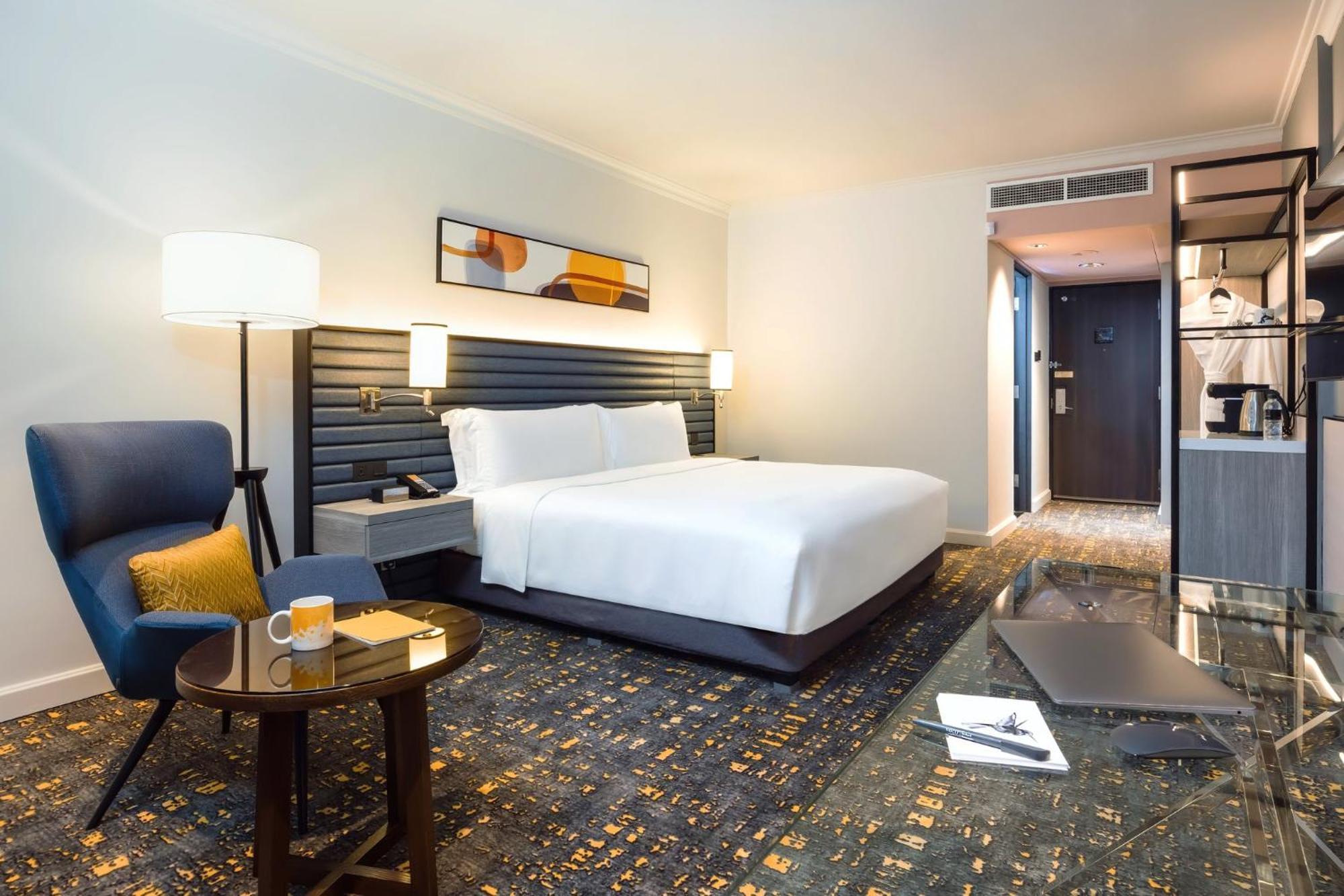 Voco Orchard Singapore By Ihg מראה חיצוני תמונה A room at the hotel
