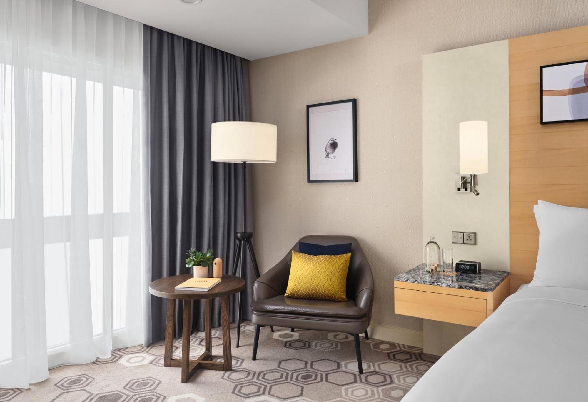 Voco Orchard Singapore By Ihg מראה חיצוני תמונה A room at the hotel