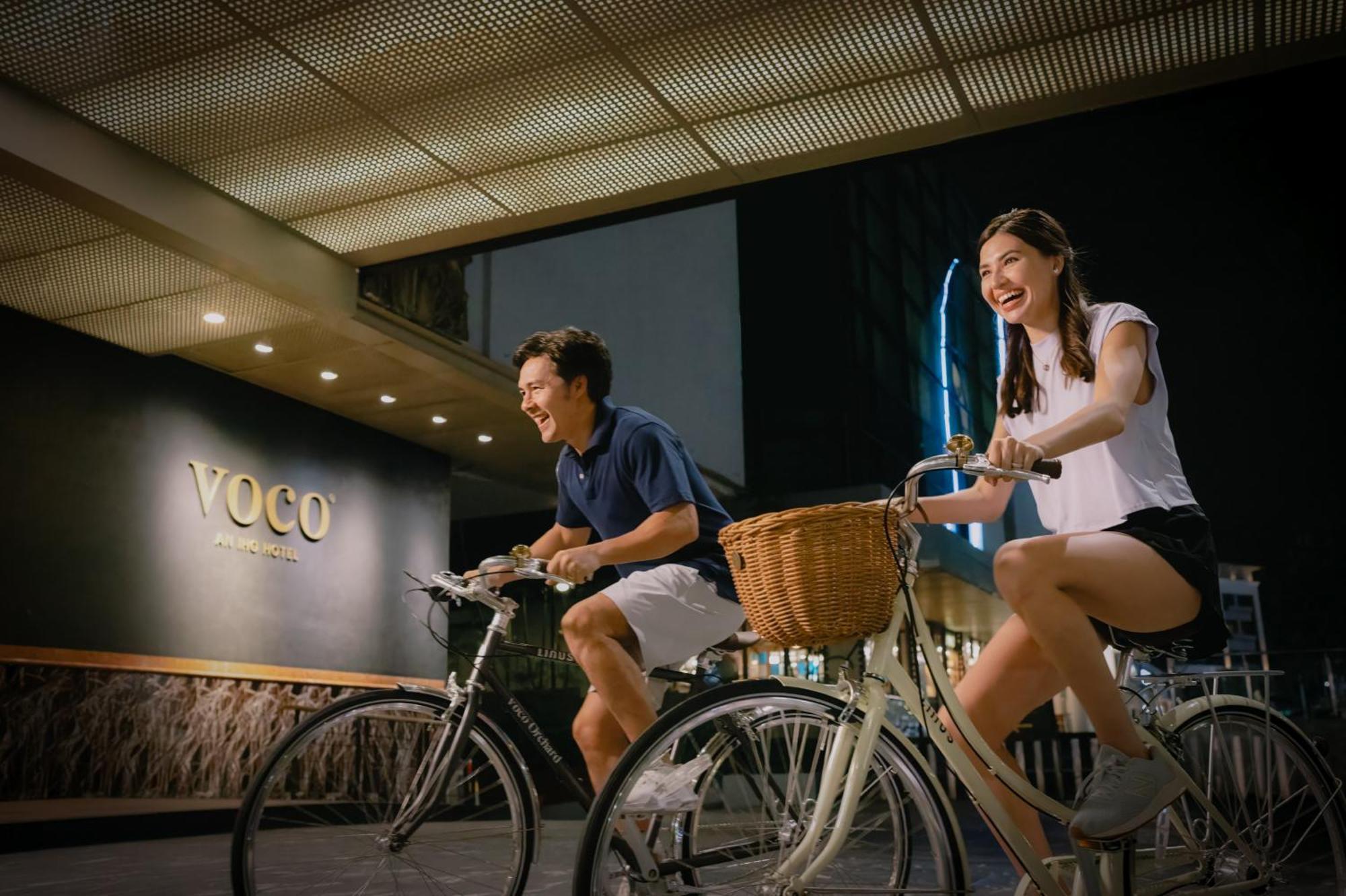 Voco Orchard Singapore By Ihg מראה חיצוני תמונה Bicycle sharing station at Voco Central
